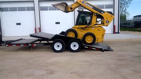 loading skid steer in dump truck|tilt bed skid loader trailers.